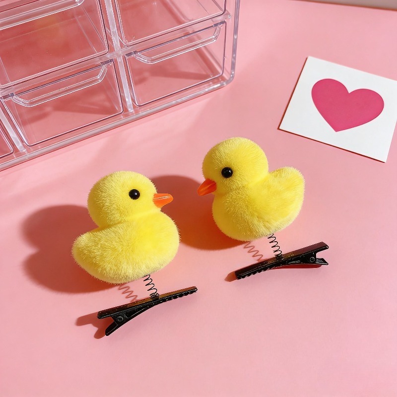Photography Duck - A cute cartoon yellow duckling spring